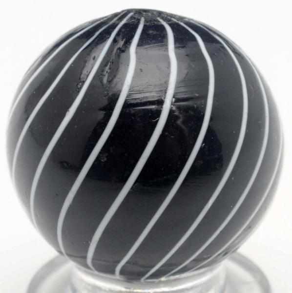 Appraisal: Black Clambroth Marble Black opaque base with white outer lines