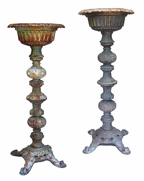 Appraisal: A pair of large cast iron jardinieres on stands late