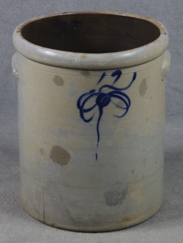 Appraisal: Large Twelve-Gallon Cylindrical CrockHaving cobalt above simple cobalt bow motif