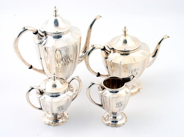 Appraisal: Fluted urn form quality consisting of teapot t coffee pot