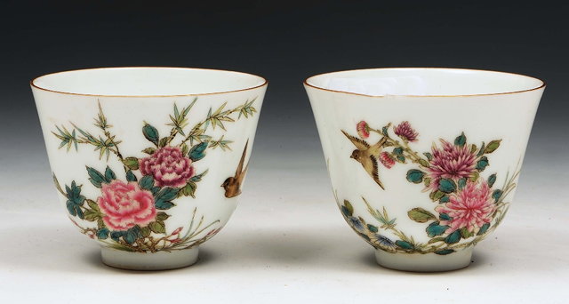 Appraisal: A pair of Chinese white ground porcelain wine cupsRepublic period