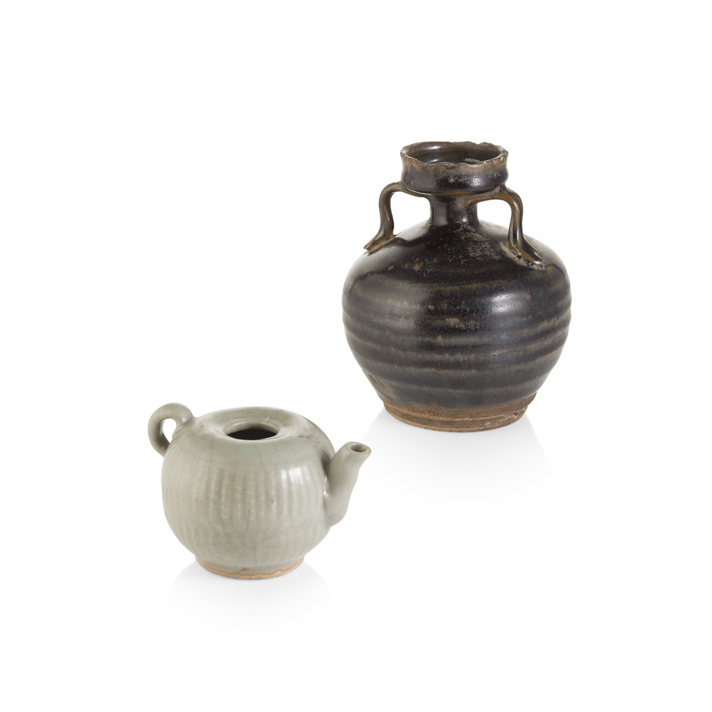 Appraisal: CIZHOU-TYPE TWIN-HANDLED JAR the ovoid body covered in a lustrous