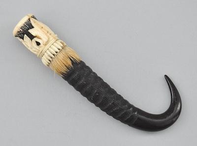 Appraisal: A Carved Ivory and Horn Talon Scent Bottle A unique