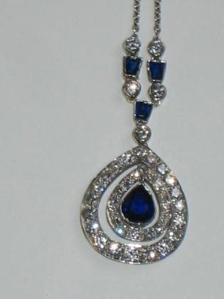 Appraisal: A DIAMOND AND SAPPHIRE NECKLACE comprising pearl shaped sapphire suspended