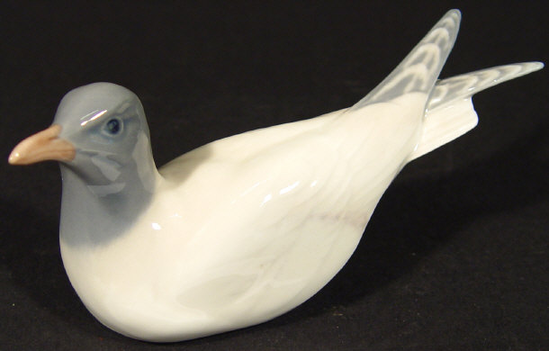 Appraisal: Royal Copenhagen china gull number with hand painted decoration and