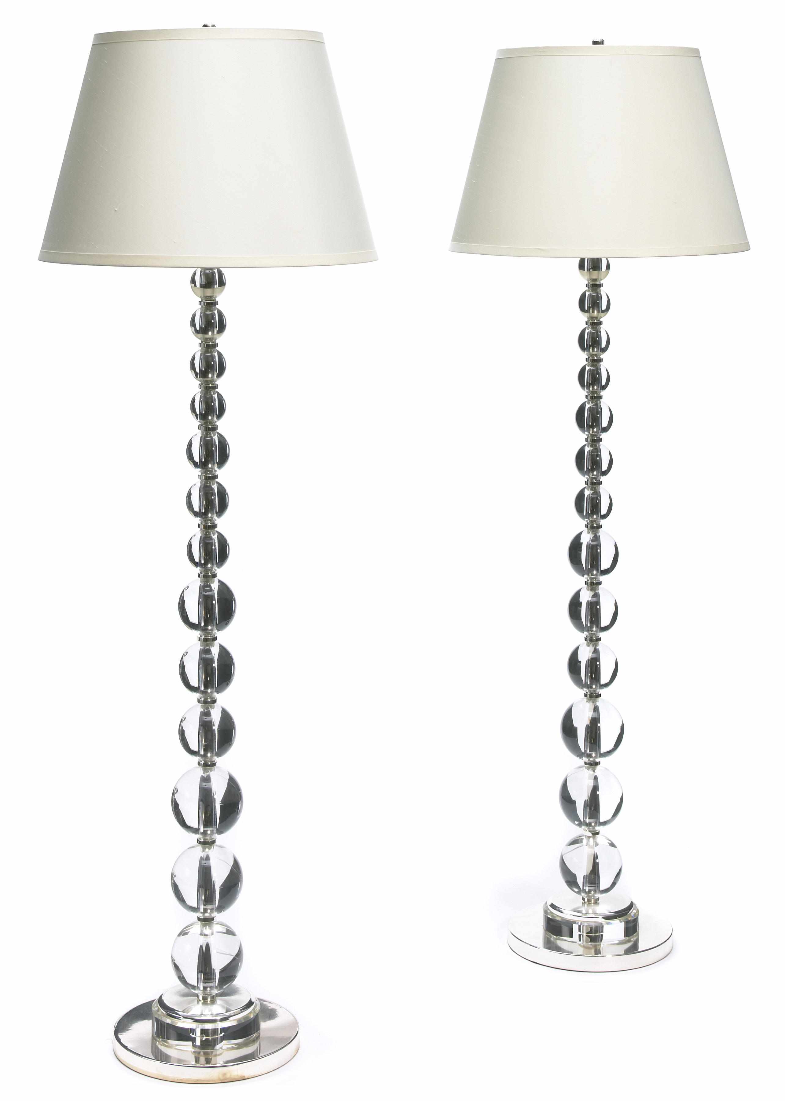 Appraisal: A pair of Modern acrylic and chromed metal floor lamps