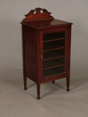 Appraisal: An Edwardian mahogany and inlaid sheet music cabinet with glazed