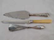 Appraisal: A silver bladed cake knife a silver handled cake slice