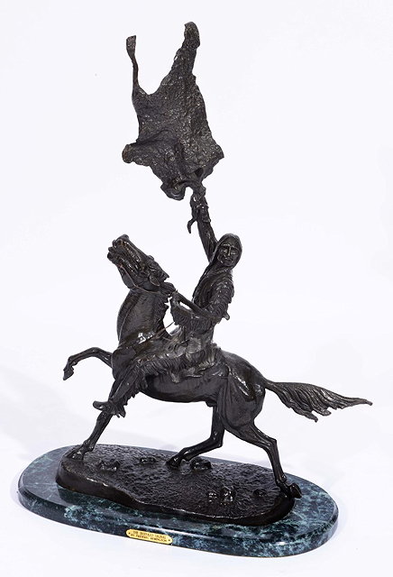 Appraisal: AFTER FREDERIC REMINGTONA large bronze North American Indian on horseback