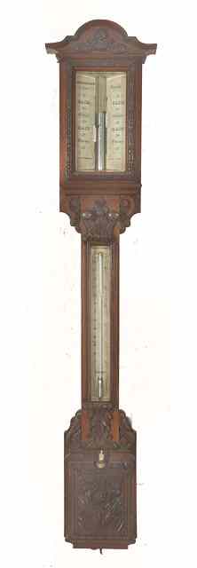 Appraisal: A VICTORIAN OAK STICK BAROMETER the rectangular two piece ivory