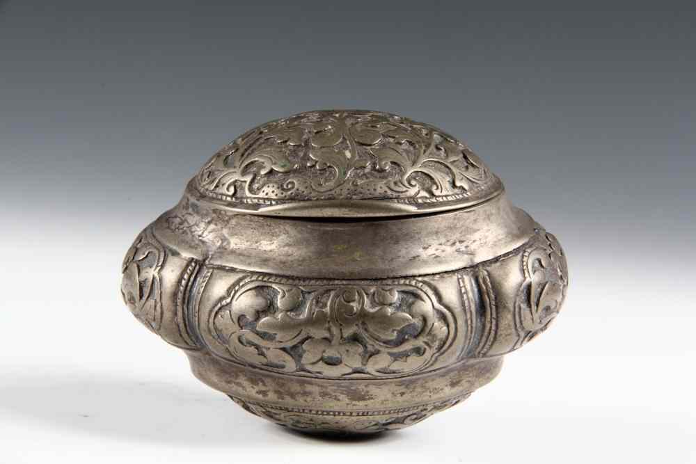 Appraisal: SILVER BETEL NUT BOX- equipped with an eyelet for hanging