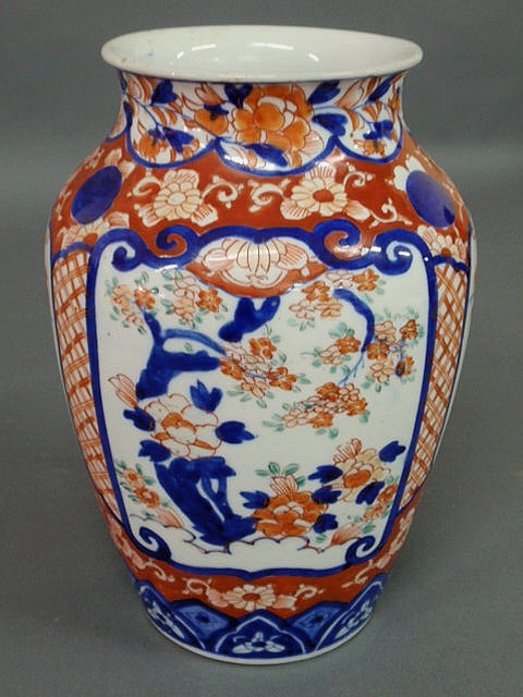 Appraisal: Colorful Imari vase th c with panels of flowers h