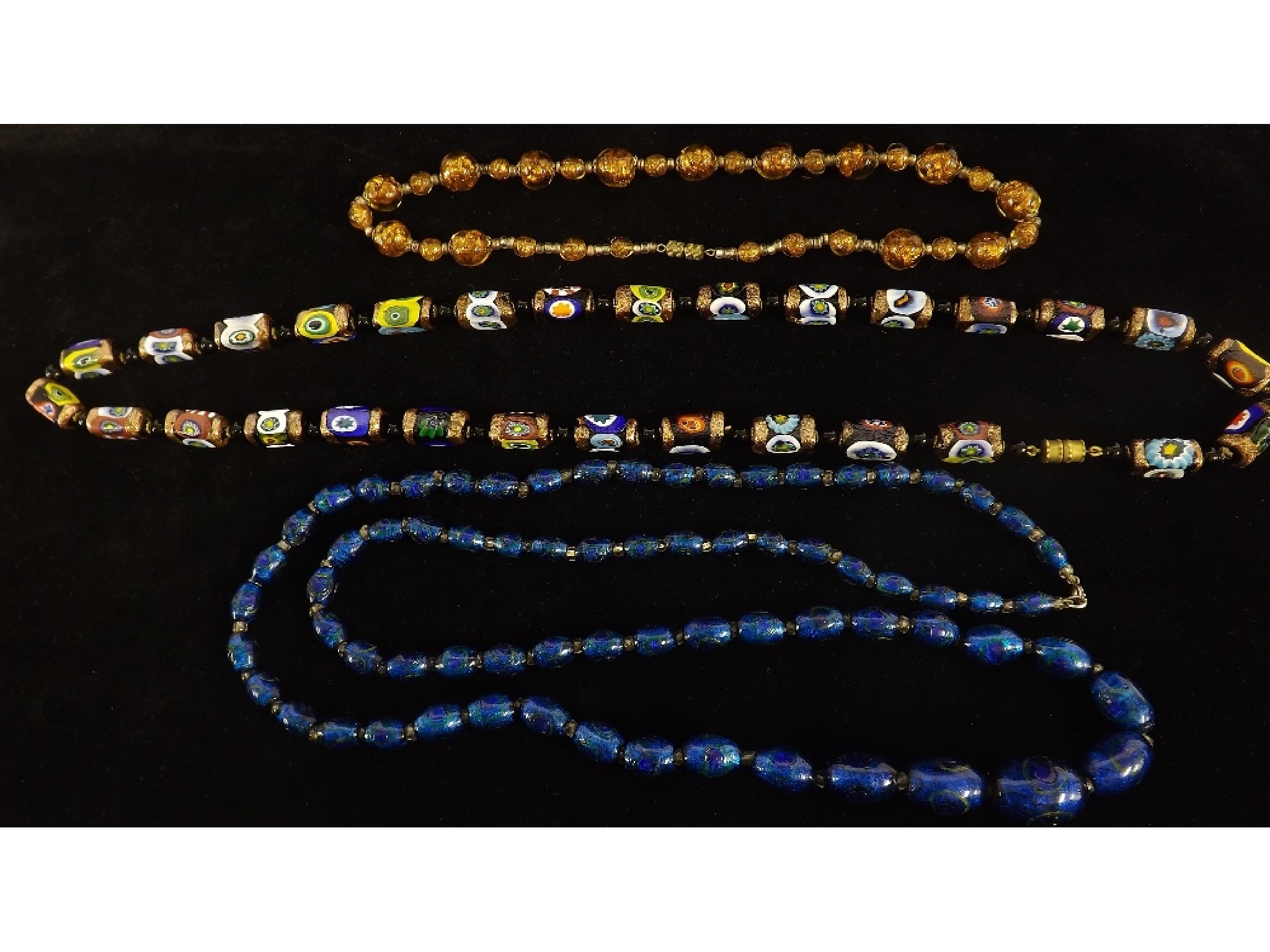 Appraisal: Venetian millefiori glass oblong bead necklet together with two other