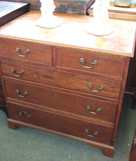 Appraisal: A George III mahogany chest of two short and three