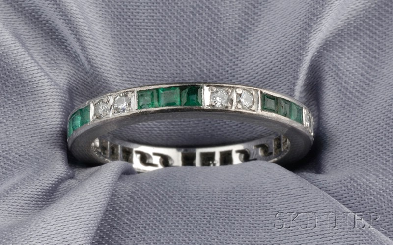 Appraisal: kt White Gold Emerald and Diamond Eternity Band channel-set with