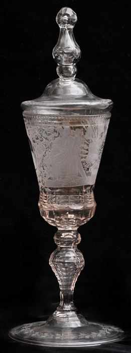 Appraisal: SILESIAN-TYPE ENGRAVED GLASS POKLE AND ASSOCIATED COVER The bowl engraved