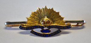 Appraisal: Australian Commonwealth Military Forces an ct and enamelled pin badge