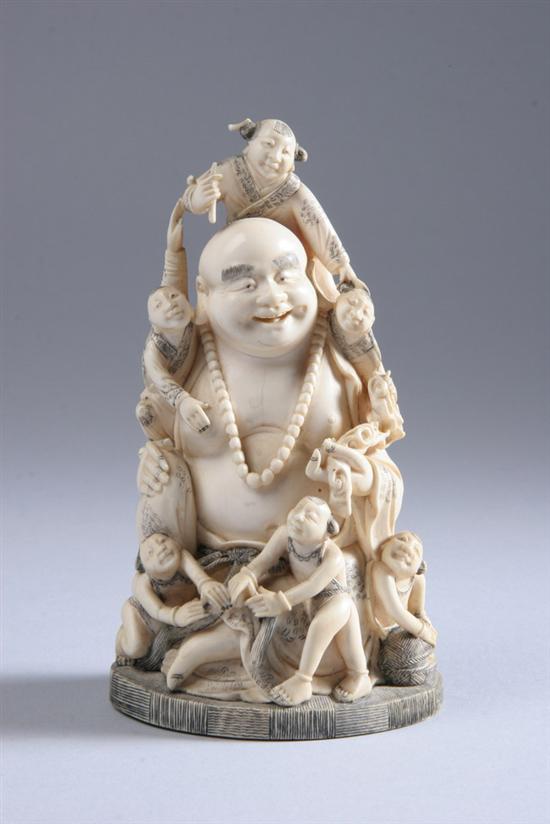 Appraisal: CHINESE IVORY FIGURAL GROUP Carved with Lohan and children at