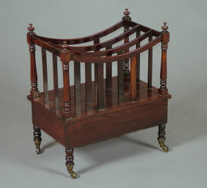 Appraisal: A George IV rosewood three division Canterbury with turned finials