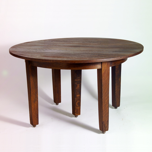 Appraisal: GUSTAV STICKLEY Five-legged dining table with circular top and apron