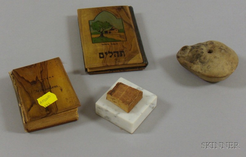 Appraisal: Group of Judaica Bezalel olivewood-bound siddur oil lamp book Ancient