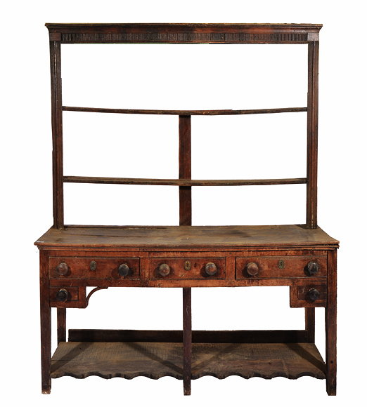 Appraisal: A GEORGE III OAK DRESSER with two shelf plate rack