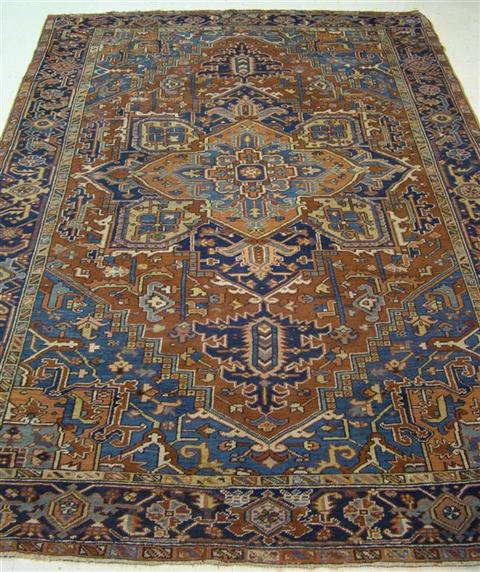 Appraisal: HERIZ RUG BLUE AND RED x INCHES