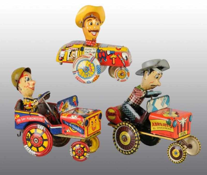 Appraisal: Lot of Tin Whoopee Car Wind-Up Toys Description Circa s