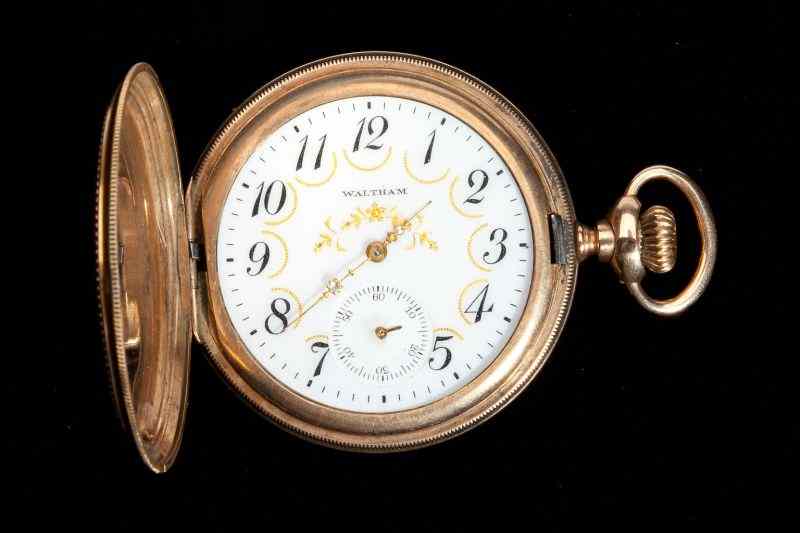 Appraisal: Gent's Pocket Watch Walthamin ornately decorated hunter case with white