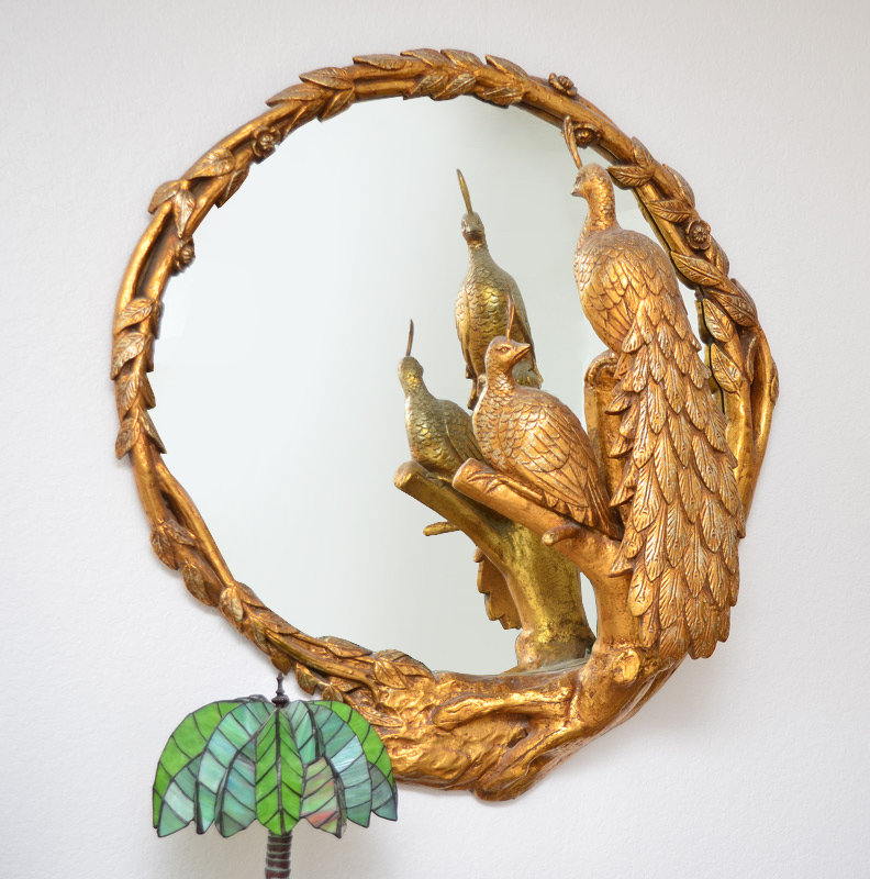 Appraisal: OUTRAGEOUS GILT PEACOCK MIRROR Silver and gold gilt carved wood