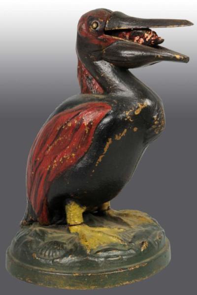 Appraisal: Cast Iron Pelican Mechanical Bank Description Manufactured by J E