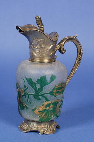 Appraisal: A DAUM AN ACID ETCHED GLASS CLARET JUG the glass