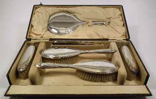 Appraisal: A George V silver backed dressing table set of plain