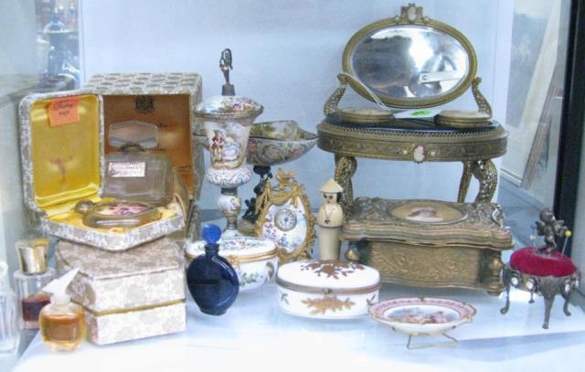 Appraisal: A group of French style dresser accessories including compacts stand