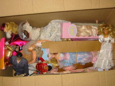 Appraisal: Ten various Barbie dolls two Ken dolls and various outfits