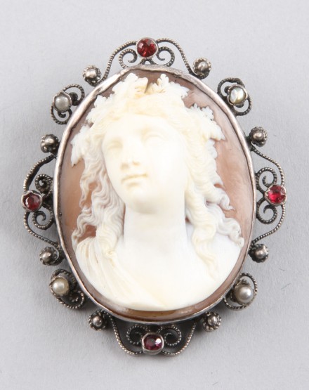 Appraisal: Silver with red stones and pearls hand made frame with