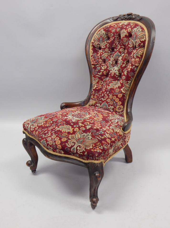 Appraisal: A Victorian mahogany spoon back chair with a show frame