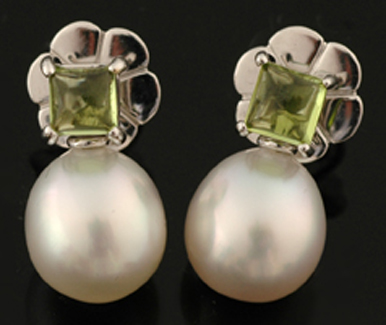 Appraisal: A pair of South Sea pearl and peridot earrings The