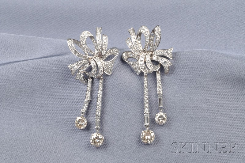 Appraisal: Platinum and Diamond Earpendants each designed as a stylized bow