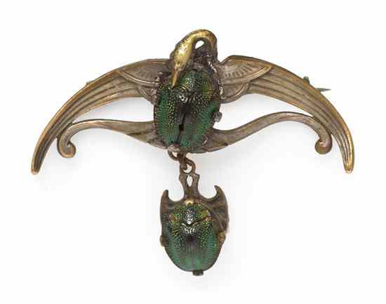 Appraisal: A Victorian Scarab Beetle Brooch in a winged swan motif