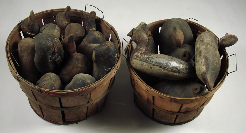 Appraisal: ELEVEN FACTORY DECOYS CONTAINED IN TWO FRUIT BASKETS Mostly Masons