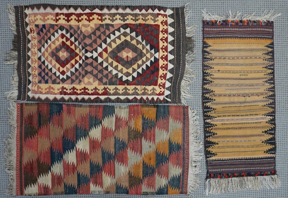 Appraisal: THREE KILIM RUGS LARGEST FT IN X FT INThree Kilim