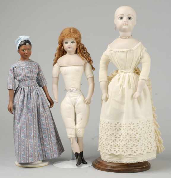 Appraisal: Lot of Bisque Dolls Description Reproduction F G lady dolls