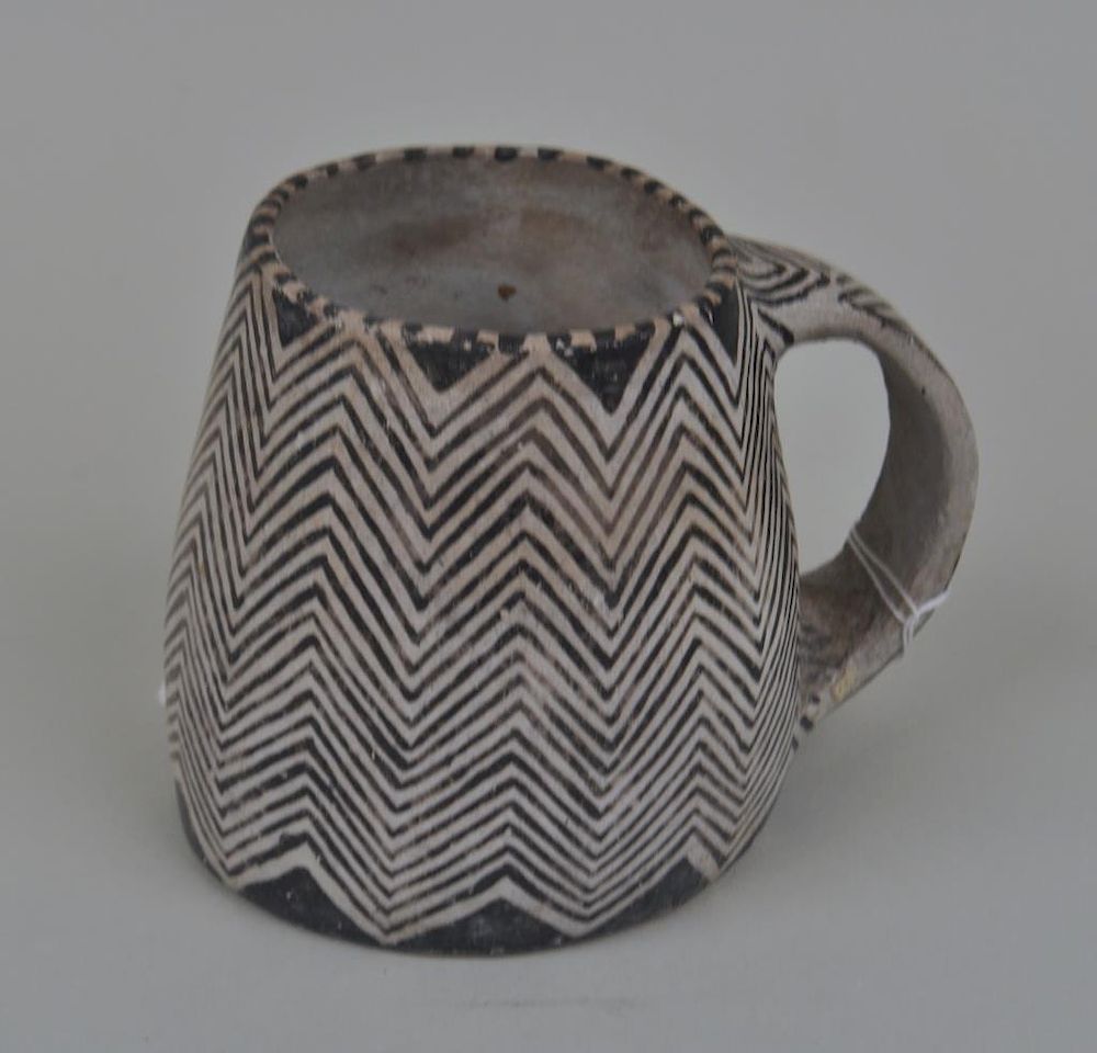 Appraisal: Anasazi Pottery Mug in black and white zigzag pattern Handling