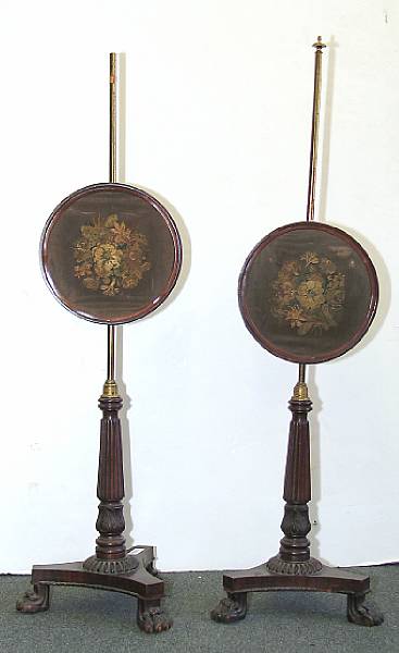 Appraisal: A pair of William IV mahogany pole screens second quarter