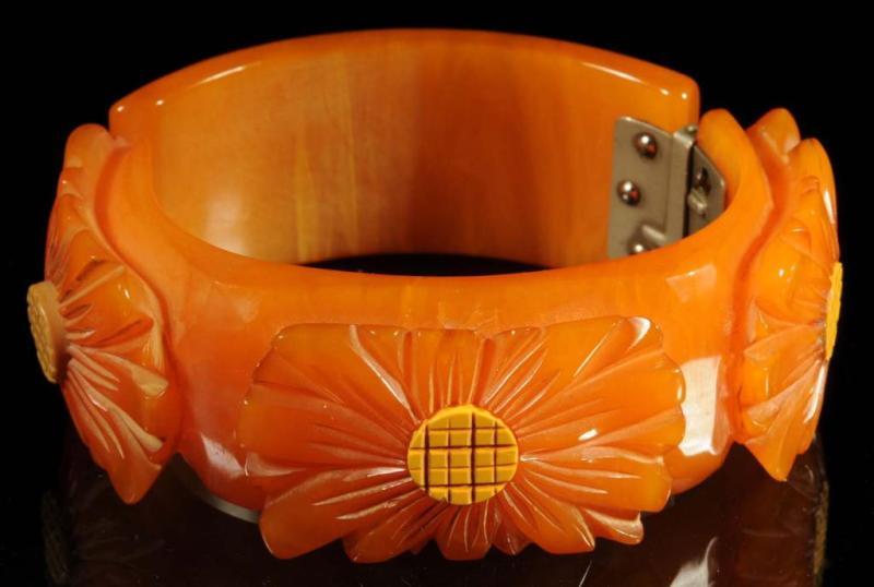 Appraisal: Bakelite Daisy Hinged Bracelet Description Nice deep carving Condition Excellent