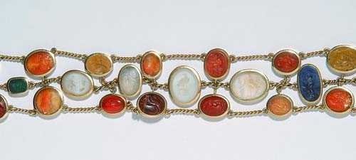 Appraisal: GEM BRACELET Yellow gold Fancy bracelet with oval gem stones