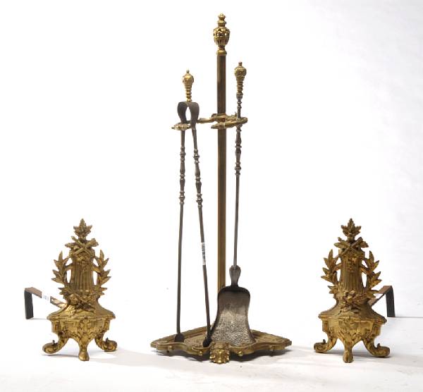 Appraisal: A pair of Louis XVI style gilt bronze chenets and