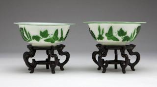 Appraisal: A pair of Chinese glass green and white overlay bowls