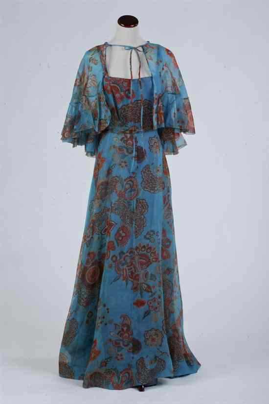 Appraisal: HARDY AMIES AQUA AND ORANGE PAISLEY MAXI DRESS WITH CAPELET